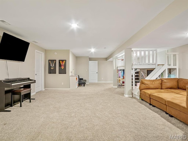 living room with carpet, baseboards, and stairway