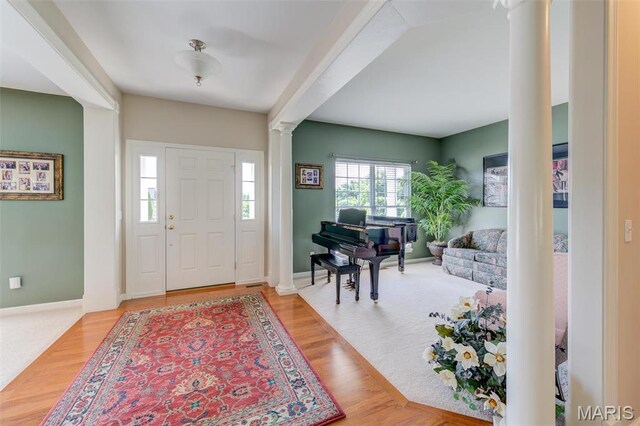 41 Deer Creek Dr, Ofallon, MO 63366 - foyer entrance featuring decorative columns and wood finished floors