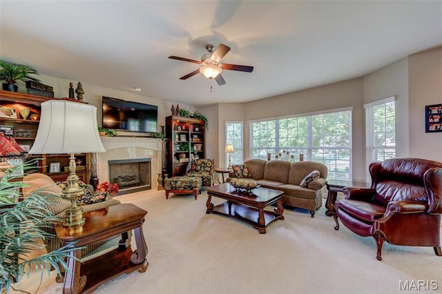 41 Deer Creek Dr, Ofallon, MO 63366 - carpeted living room featuring ceiling fan, plenty of natural light, and a high end fireplace