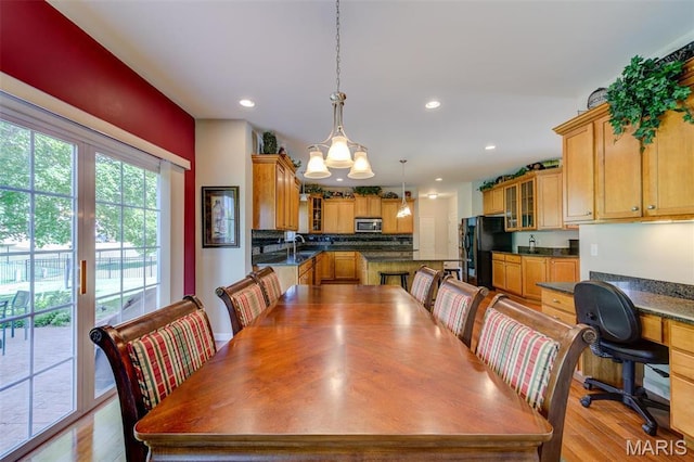 41 Deer Creek Dr, Ofallon, MO 63366 - dining space featuring recessed lighting, light wood-type flooring, and a chandelier
