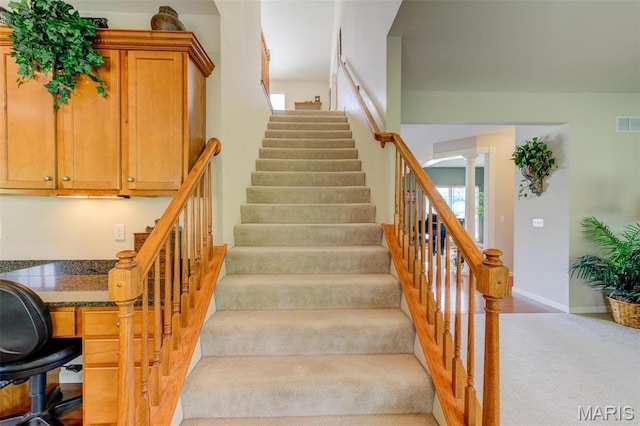 41 Deer Creek Dr, Ofallon, MO 63366 - stairs featuring carpet flooring, ornate columns, and baseboards