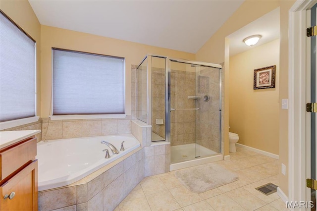 41 Deer Creek Dr, Ofallon, MO 63366 - bathroom featuring a stall shower, tile patterned floors, toilet, a garden tub, and vanity