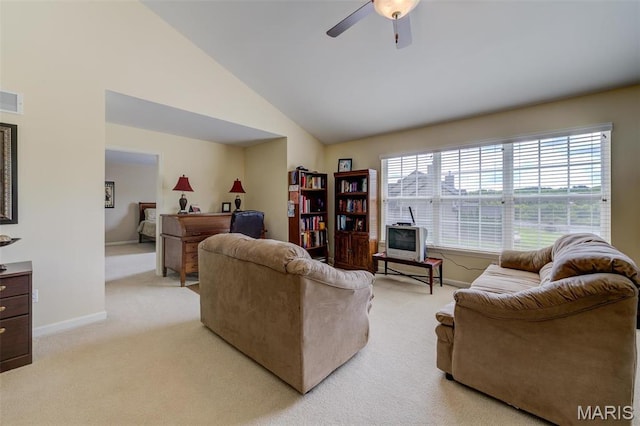 41 Deer Creek Dr, Ofallon, MO 63366 - living area featuring light colored carpet, baseboards, ceiling fan, and vaulted ceiling
