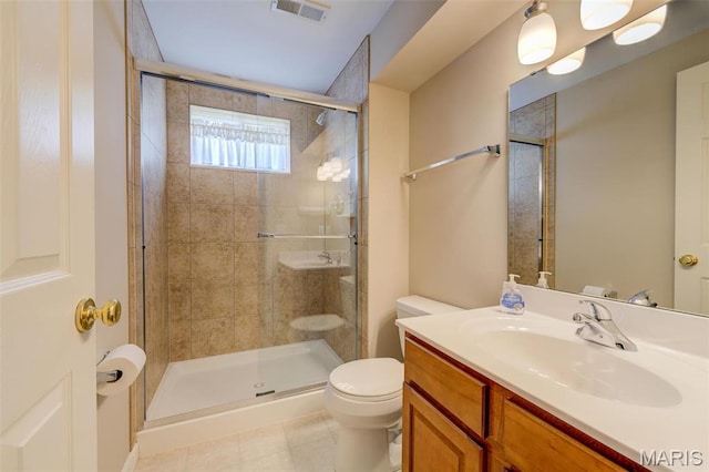 41 Deer Creek Dr, Ofallon, MO 63366 - full bathroom with toilet, a stall shower, tile patterned flooring, and vanity