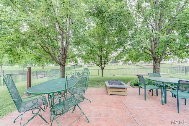 41 Deer Creek Dr, Ofallon, MO 63366 - view of patio / terrace featuring outdoor dining area and a fire pit