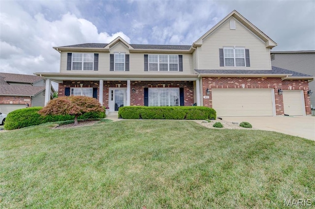 41 Deer Creek Dr, Ofallon, MO 63366 - view of front of property featuring brick siding, concrete driveway, a front lawn, and a garage