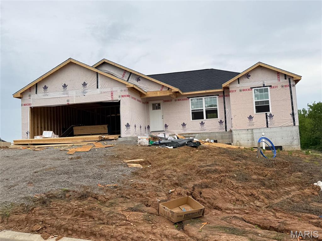 582 Wentworth Dr, Jackson, MO 63755 - property in mid-construction featuring a garage