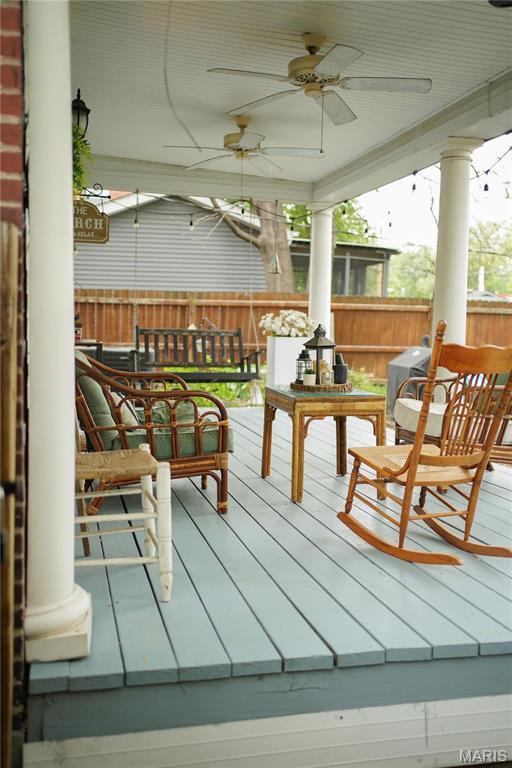 111 Portland Ave, Belleville, IL 62220 - wooden terrace with fence and a ceiling fan