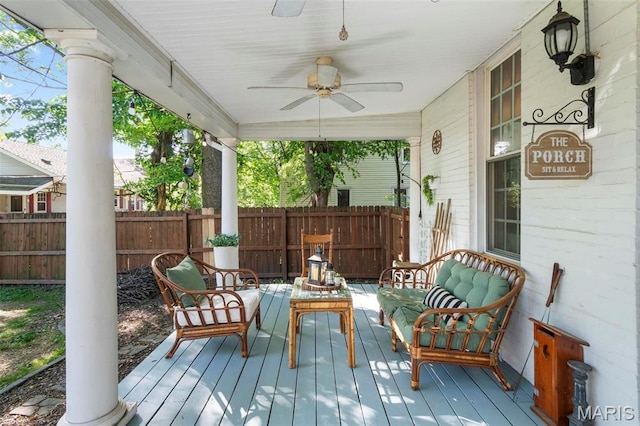 111 Portland Ave, Belleville, IL 62220 - deck featuring fence, a ceiling fan, and an outdoor living space