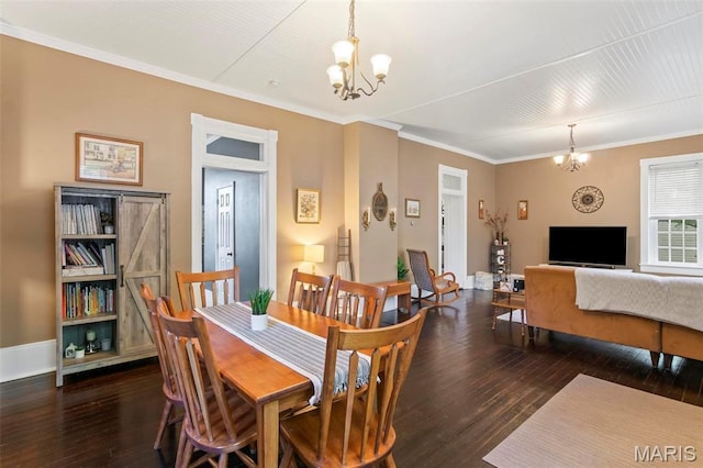 111 Portland Ave, Belleville, IL 62220 - dining area with a chandelier, wood-type flooring, and crown molding