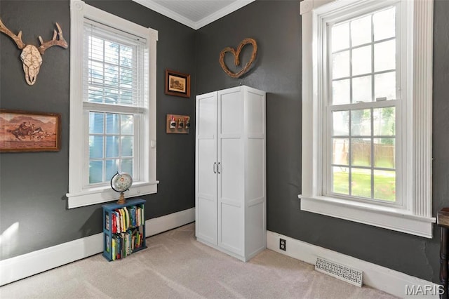 111 Portland Ave, Belleville, IL 62220 - bedroom featuring light colored carpet, crown molding, and baseboards