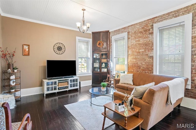 111 Portland Ave, Belleville, IL 62220 - living room featuring baseboards, brick wall, wood-type flooring, a chandelier, and crown molding