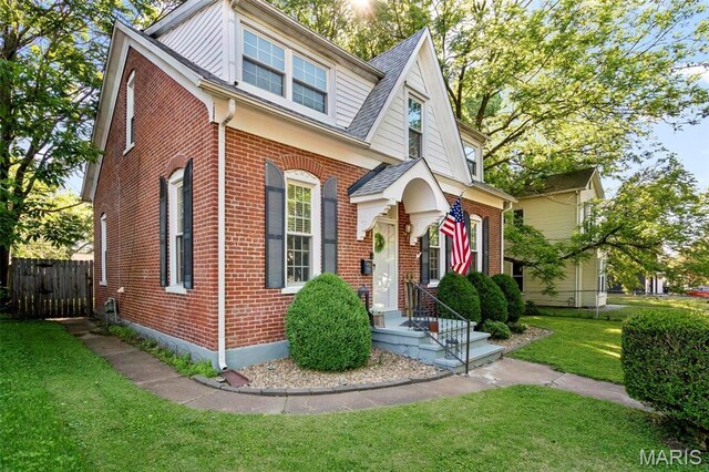 111 Portland Ave, Belleville, IL 62220 - view of front of home with brick siding and a shingled roof