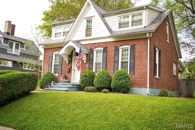 111 Portland Ave, Belleville, IL 62220 - view of front facade featuring brick siding and roof with shingles