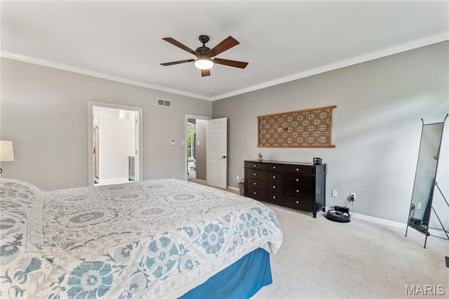 carpeted bedroom with crown molding, baseboards, and a ceiling fan