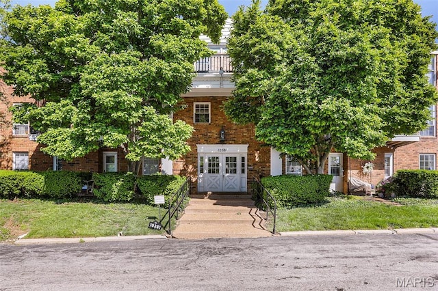10381 Oxford Hill Dr Unit 6, Saint Louis, MO 63146 - view of property hidden behind natural elements featuring brick siding