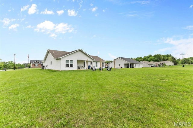 710 Skye View Ct, Farmington, MO 63640 - back of property with a lawn