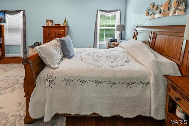 bedroom featuring wood finished floors