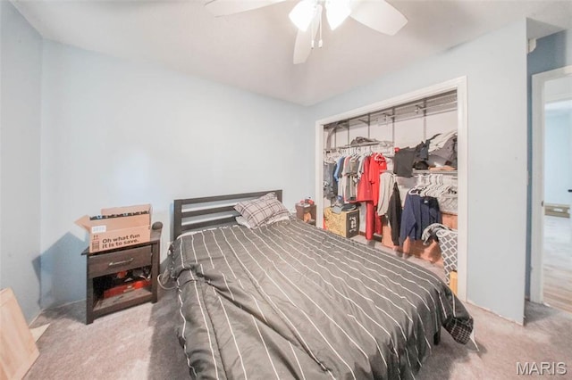 bedroom featuring carpet flooring, a closet, and a ceiling fan