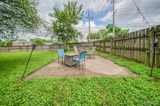 view of yard with a patio area