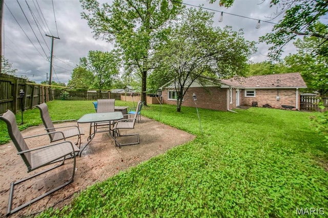 view of yard with a patio area