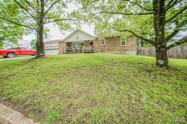ranch-style home featuring a garage, brick siding, and covered porch