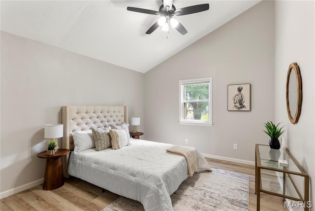 312 Waller Ave, Saint Louis, MO 63125 - bedroom with light wood-style flooring, baseboards, vaulted ceiling, and ceiling fan