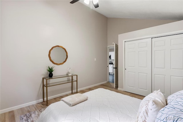 312 Waller Ave, Saint Louis, MO 63125 - bedroom with lofted ceiling, light wood-style flooring, a closet, baseboards, and ceiling fan