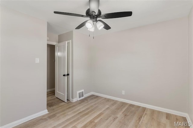 312 Waller Ave, Saint Louis, MO 63125 - unfurnished room featuring light wood-type flooring, baseboards, and ceiling fan