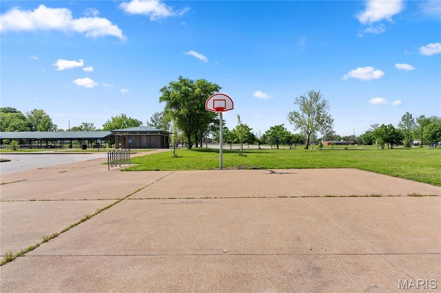 312 Waller Ave, Saint Louis, MO 63125 - view of basketball court with a yard and basketball hoop
