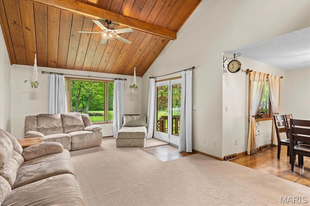 22000 E Rd, Carlyle, IL 62231 - living room with beamed ceiling, ceiling fan, carpet floors, baseboards, and wood ceiling