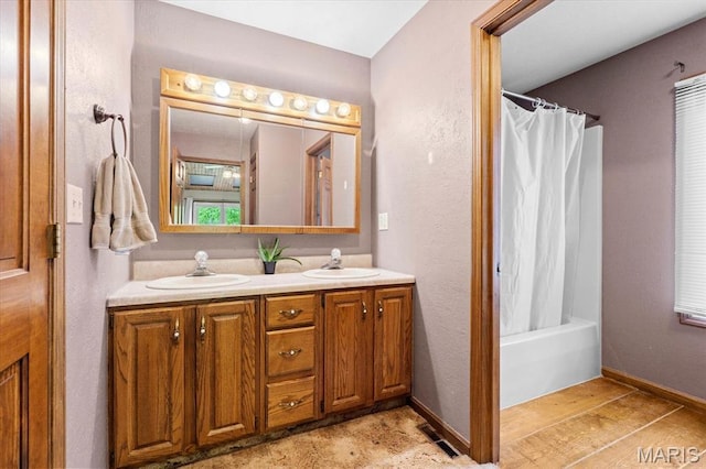 22000 E Rd, Carlyle, IL 62231 - full bath featuring double vanity and shower / bath combo with shower curtain