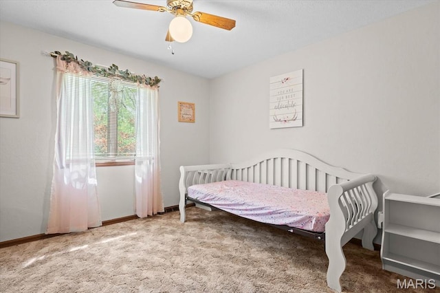 22000 E Rd, Carlyle, IL 62231 - bedroom with carpet, a ceiling fan, and baseboards