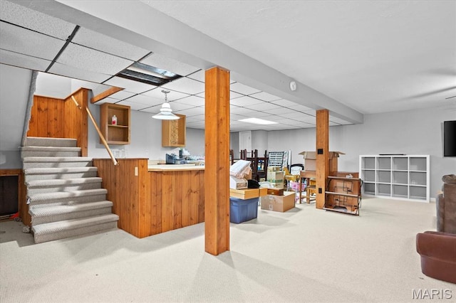 22000 E Rd, Carlyle, IL 62231 - finished below grade area featuring carpet floors, stairway, and a paneled ceiling