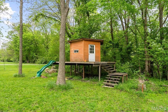 22000 E Rd, Carlyle, IL 62231 - view of jungle gym featuring a yard, an outdoor structure, and stairway