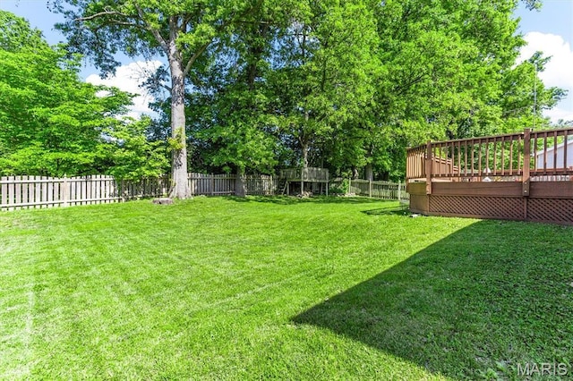 view of yard with a wooden deck