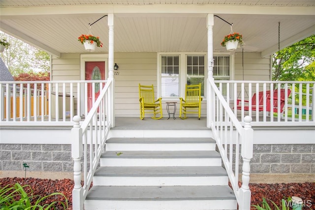 721 Taylor Ave, Godfrey, IL 62035 - doorway to property with a porch