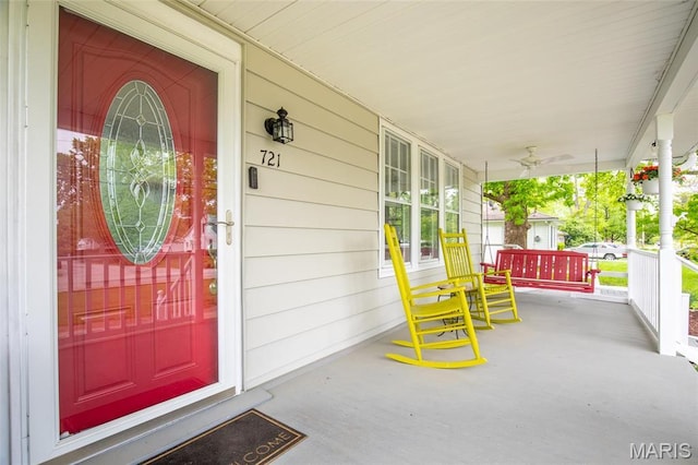 721 Taylor Ave, Godfrey, IL 62035 - view of exterior entry featuring a porch