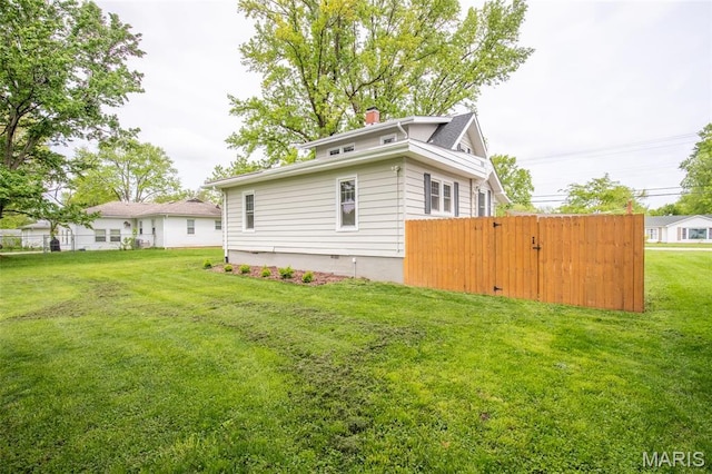 721 Taylor Ave, Godfrey, IL 62035 - back of property with a chimney