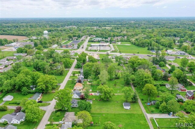 721 Taylor Ave, Godfrey, IL 62035 - aerial view of residential area featuring a heavily wooded area