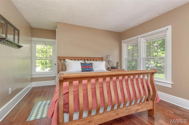 721 Taylor Ave, Godfrey, IL 62035 - bedroom with baseboards and wood finished floors