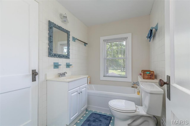 721 Taylor Ave, Godfrey, IL 62035 - bathroom with a bath, toilet, tile walls, and vanity
