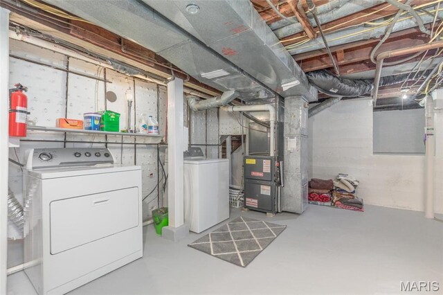 721 Taylor Ave, Godfrey, IL 62035 - unfinished basement with washer and dryer and heating unit