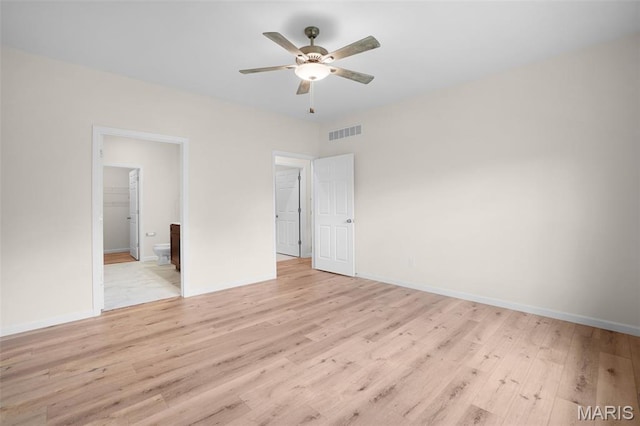 3304 Nat View Ct, Washington, MO 63090 - unfurnished bedroom featuring light wood-type flooring, ensuite bathroom, and ceiling fan