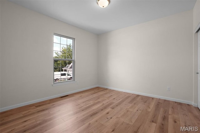 3304 Nat View Ct, Washington, MO 63090 - empty room with light wood-style flooring and baseboards