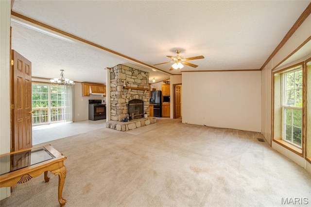 24 Clonts Rd, Sullivan, MO 63080 - unfurnished living room featuring healthy amount of natural light, a chandelier, light carpet, a fireplace, and crown molding