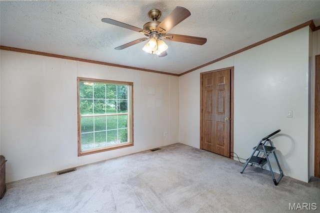 24 Clonts Rd, Sullivan, MO 63080 - carpeted empty room with lofted ceiling, a ceiling fan, a textured ceiling, and ornamental molding