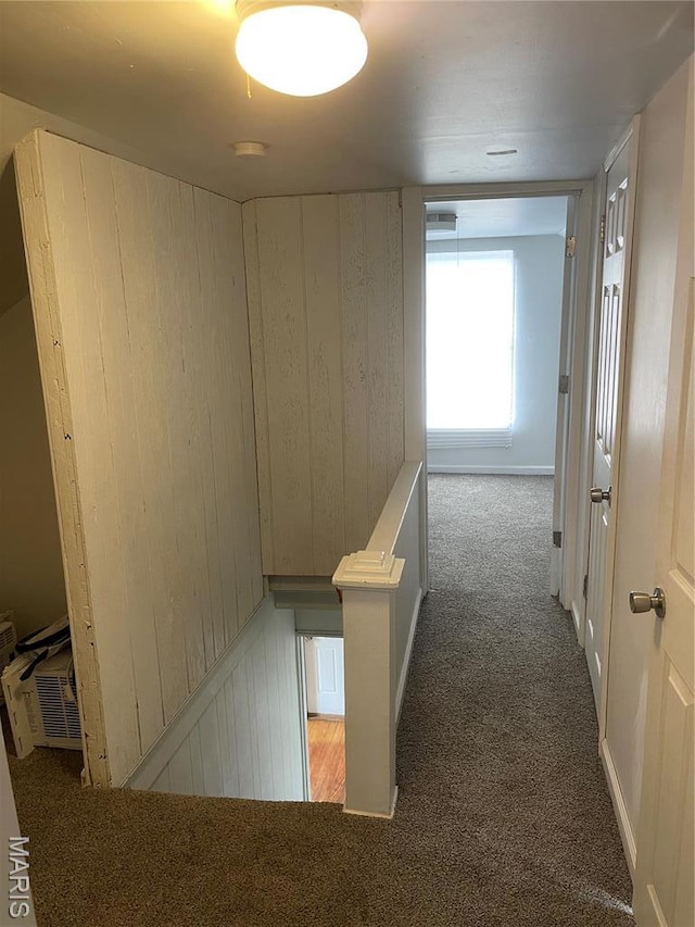 219 2nd St, Winfield, MO 63389 - hall with an upstairs landing, carpet, and wooden walls
