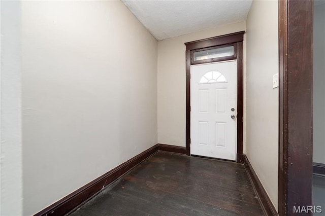 4210 E Carter Ave, Saint Louis, MO 63115 - entryway featuring wood-type flooring and baseboards