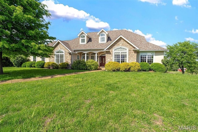 3033 Oakvale Rd, De Soto, MO 63020 - view of front of house featuring stone siding and a front yard